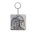 Keychain with mushroom design on a white background